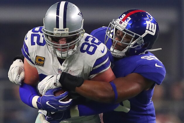 ARLINGTON, TX - SEPTEMBER 10:  Jason Witten #82 of the Dallas Cowboys is stopped by B.J. Goodson #93 of the New York Giants on a carry in the first quarter of a game at AT&T Stadium on September 10, 2017 in Arlington, Texas.  (Photo by Tom Pennington/Getty Images)