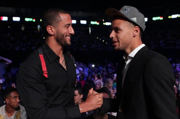 OAKLAND, CA - JUNE 20: Colin Kaepernick (L) and Stephen Curry attend the Cruiserweight fight between Andre Ward and Paul Smith at ORACLE Arena on June 20, 2015 in Oakland, California. (Photo by Alexis Cuarezma/Getty Images)