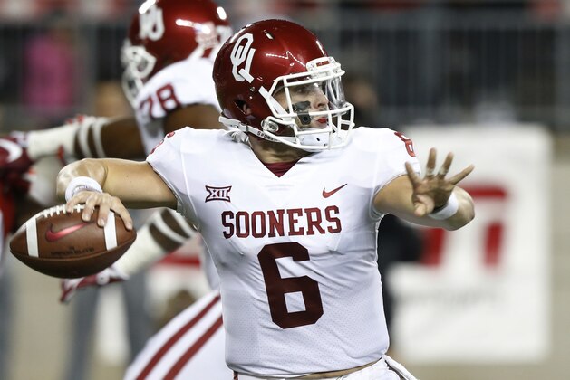 Oklahoma quarterback Baker Mayfield drops back to pass against Ohio State during the first half of an NCAA college football game Saturday, Sept. 9, 2017, in Columbus, Ohio. (AP Photo/Jay LaPrete)