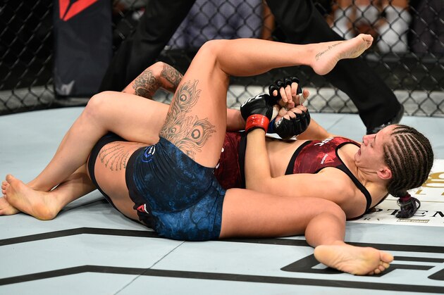 EDMONTON, AB - SEPTEMBER 09:  (R-L) Sarah Moras of Canada attempts to submit Ashlee Evans-Smith in their women's bantamweight bout during the UFC 215 event inside the Rogers Place on September 9, 2017 in Edmonton, Alberta, Canada. (Photo by Jeff Bottari/Zuffa LLC/Zuffa LLC via Getty Images)