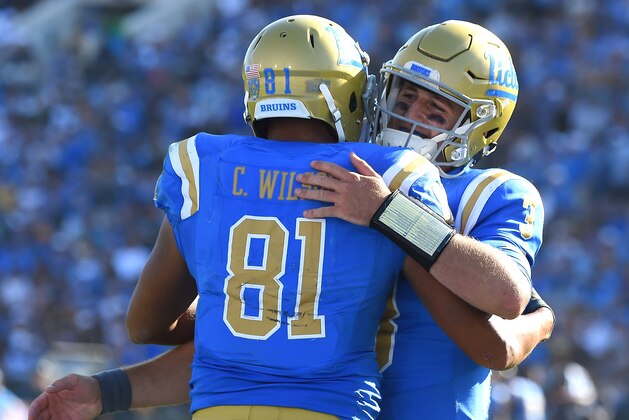 PASADENA, CA - SEPTEMBER 09: Caleb Wilson #81 of the UCLA Bruins gets a hug from quarterback Josh Rosen #3 of the UCLA Bruins after a touchdown in the fourth quarter of the game against the Hawaii Warriors at the Rose Bowl on September 9, 2017 in Pasadena, California. (Photo by Jayne Kamin-Oncea/Getty Images)