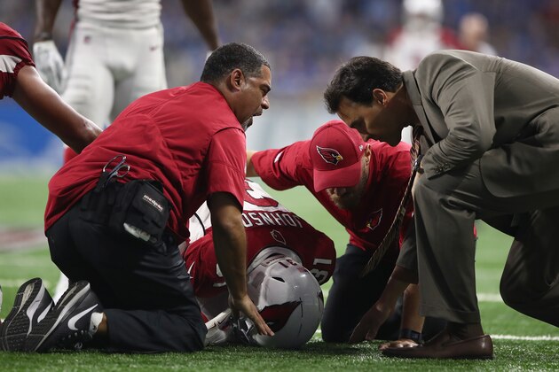 DETROIT, MI - SEPTEMBER 10: David Johnson #31 of the Arizona Cardinals is attended to by medical staff after a second half injury while playing the Detroit Lions at Ford Field on September 10, 2017 in Detroit, Michigan. Detroit won the game 35-23. (Photo by Gregory Shamus/Getty Images)