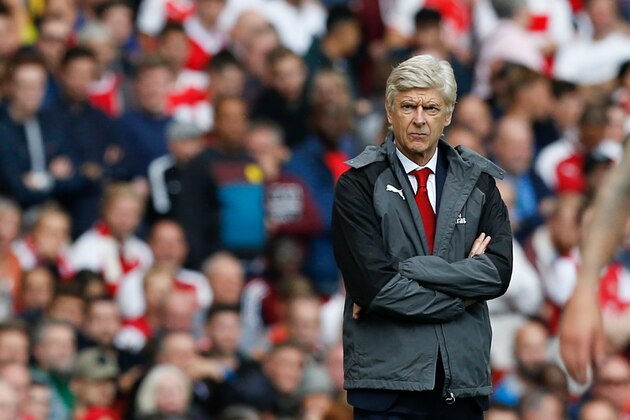 Arsenal's French manager Arsene Wenger watches on during the English Premier League football match between Arsenal and Bournemouth at the Emirates Stadium in London on September 9, 2017. / AFP PHOTO / Ian KINGTON / RESTRICTED TO EDITORIAL USE. No use with unauthorized audio, video, data, fixture lists, club/league logos or 'live' services. Online in-match use limited to 75 images, no video emulation. No use in betting, games or single club/league/player publications.  /         (Photo credit should read IAN KINGTON/AFP/Getty Images)