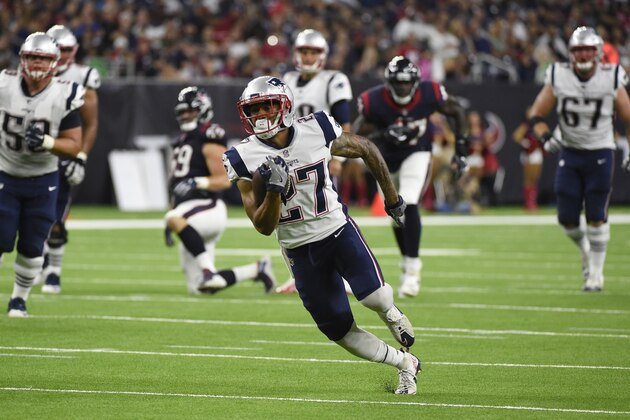 New England Patriots running back D.J. Foster (27) runs for a touchdown during the second half of an NFL football preseason game against the Houston Texans on Saturday, Aug. 19, 2017, in Houston. (AP Photo/Eric Christian Smith)