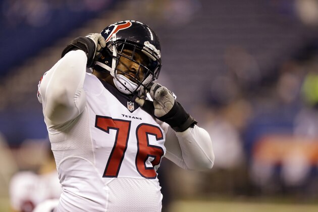 Houston Texans offensive tackle Duane Brown warms up before the start of an NFL football game between the Indianapolis Colts and the Houston Texans Sunday, Dec. 11, 2016, in Indianapolis. (AP Photo/Michael Conroy)