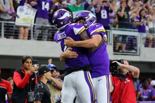 MINNEAPOLIS, MN - SEPTEMBER 11: Stefon Diggs #14 of the Minnesota Vikings and Sam Bradford #8 celebrate after connecting for a touchdown in the first half of the game against the New Orleans Saints on September 11, 2017 at U.S. Bank Stadium in Minneapolis, Minnesota. (Photo by Adam Bettcher/Getty Images)