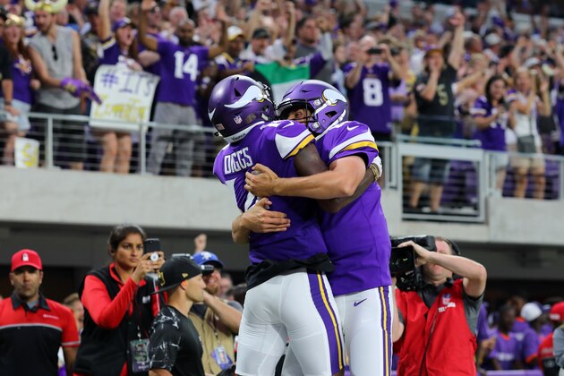 MINNEAPOLIS, MN - SEPTEMBER 11: Stefon Diggs #14 of the Minnesota Vikings and Sam Bradford #8 celebrate after connecting for a touchdown in the first half of the game against the New Orleans Saints on September 11, 2017 at U.S. Bank Stadium in Minneapolis, Minnesota. (Photo by Adam Bettcher/Getty Images)