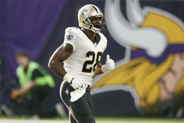 New Orleans Saints running back Adrian Peterson runs onto the field during the first half of an NFL football game against the Minnesota Vikings, Monday, Sept. 11, 2017, in Minneapolis. (AP Photo/Jim Mone)