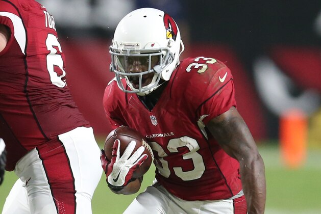 Arizona Cardinals running back Kerwynn Williams (33) during an NFL preseason football game against the Oakland Raiders, Friday, Aug. 12, 2016, in Glendale, Ariz. (AP Photo/Rick Scuteri)