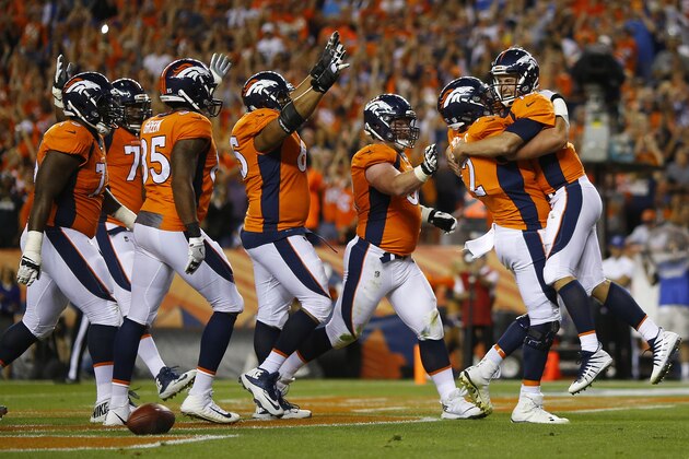 DENVER, CO - SEPTEMBER 11:  Quarterback Trevor Siemian #13 of the Denver Broncos celebrates rushing for a touchdown in the second quarter at Sports Authority Field at Mile High on September 11, 2017 in Denver, Colorado. (Photo by Justin Edmonds/Getty Images)