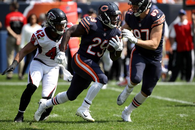 CHICAGO, IL - SEPTEMBER 10:   Tarik Cohen #29 of the Chicago Bears carries the football ahead of  Duke Riley #42 of the Atlanta Falcons in the second quarter at Soldier Field on September 10, 2017 in Chicago, Illinois.  (Photo by Jonathan Daniel/Getty Images)