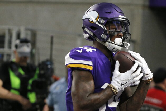 Minnesota Vikings wide receiver Stefon Diggs catches an 18-yard touchdown pass during the first half of an NFL football game against the New Orleans Saints, Monday, Sept. 11, 2017, in Minneapolis. (AP Photo/Bruce Kluckhohn)