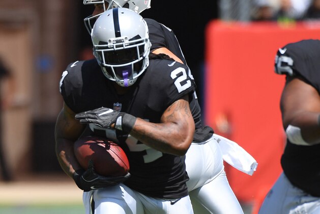 Sep 10, 2017; Nashville, TN, USA; Oakland Raiders running back Marshawn Lynch (24) runs for a short gain during the first half at Nissan Stadium. Mandatory Credit: Christopher Hanewinckel-USA TODAY Sports