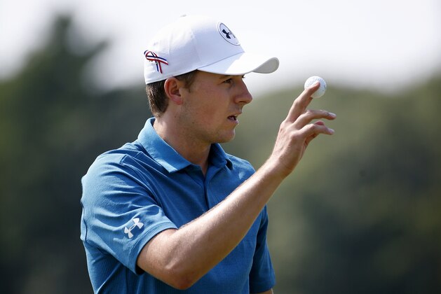 Jordan Spieth acknowledges the crowd after putting on the second hole during the final round of the Dell Technologies Championship golf tournament at TPC Boston in Norton, Mass., Monday, Sept. 4, 2017. (AP Photo/Michael Dwyer)