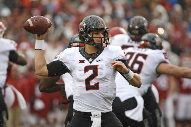 NORMAN, OK - DECEMBER 3:  Quarterback Mason Rudolph #2 of the Oklahoma State Cowboys looks to throw against the Oklahoma Sooners December 3, 2016 at Gaylord Family-Oklahoma Memorial Stadium in Norman, Oklahoma.  (Photo by Brett Deering/Getty Images)