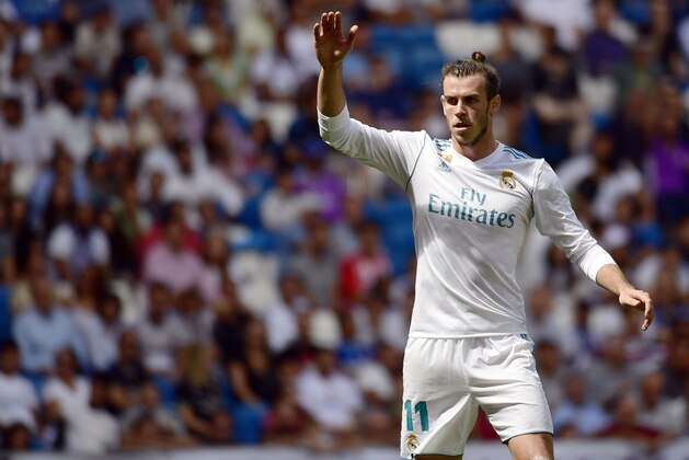 Real Madrid's Welsh forward Gareth Bale gestures during the Spanish Liga football match Real Madrid vs Levante at the Santiago Bernabeu stadium in Madrid on September 9, 2017. / AFP PHOTO / PIERRE-PHILIPPE MARCOU        (Photo credit should read PIERRE-PHILIPPE MARCOU/AFP/Getty Images)