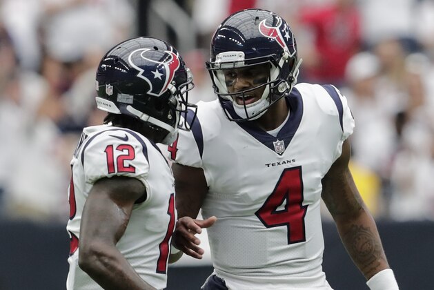 HOUSTON, TX - SEPTEMBER 10:  Deshaun Watson #4 of the Houston Texans talks with Bruce Ellington #12 in the third quarter against the Jacksonville Jaguars at NRG Stadium on September 10, 2017 in Houston, Texas.  (Photo by Tim Warner/Getty Images)