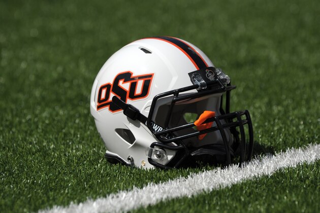 Oklahoma State helmet is pictured prior to an NCAA college football game between UTSA and Oklahoma St in Stillwater, Okla., Saturday, Sept. 19, 2015.(AP Photo/Brody Schmidt)