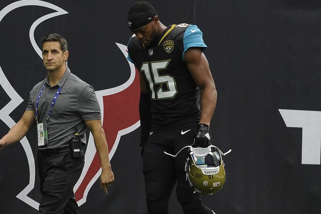 Jacksonville Jaguars wide receiver Allen Robinson (15) walks off the field with an injury in the first half of an NFL football game Sunday, Sept. 10, 2017, in Houston. (AP Photo/Eric Christian Smith)