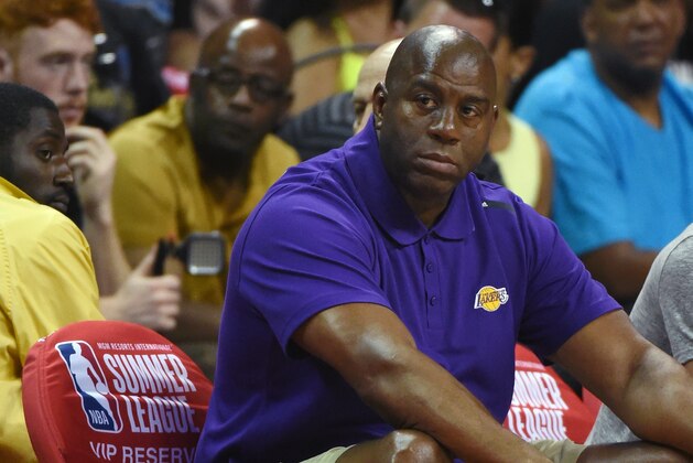 LAS VEGAS, NV - JULY 08:  Los Angeles Lakers president of basketball operations Earvin 'Magic' Johnson watches the Lakers take on the Boston Celtics during the 2017 Summer League at the Thomas & Mack Center on July 8, 2017 in Las Vegas, Nevada. Boston won 86-81. NOTE TO USER: User expressly acknowledges and agrees that, by downloading and or using this photograph, User is consenting to the terms and conditions of the Getty Images License Agreement.  (Photo by Ethan Miller/Getty Images)