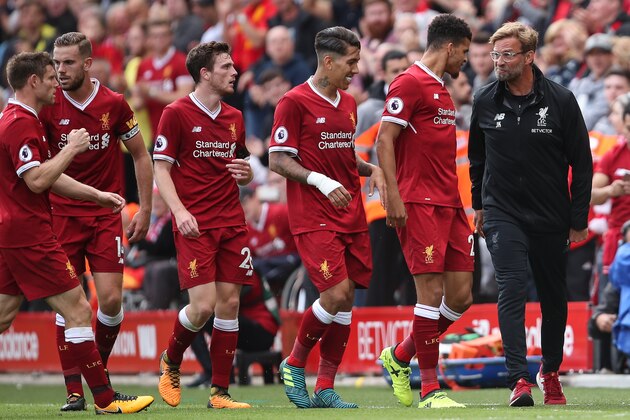 LIVERPOOL, ENGLAND - AUGUST 19: Jurgen Klopp manager / head coach of Liverpool celebrates with Dominic Solanke of Liverpool after Sadio Mane of Liverpool scores a goal to make it 1-0 during the Premier League match between Liverpool and Crystal Palace at Anfield on August 19, 2017 in Liverpool, England. (Photo by Robbie Jay Barratt - AMA/Getty Images)