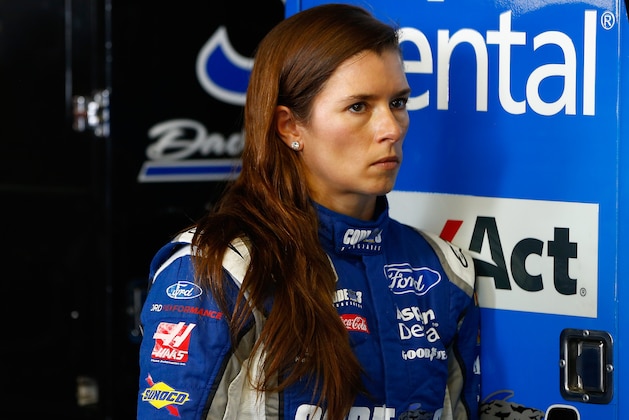 BROOKLYN, MI - AUGUST 11:  Danica Patrick, driver of the #10 Code 3 Associates Ford, stands in the garage area during practice for the Monster Energy NASCAR Cup Series Pure Michigan 400 at Michigan International Speedway on August 11, 2017 in Brooklyn, Michigan.  (Photo by Jonathan Ferrey/Getty Images)