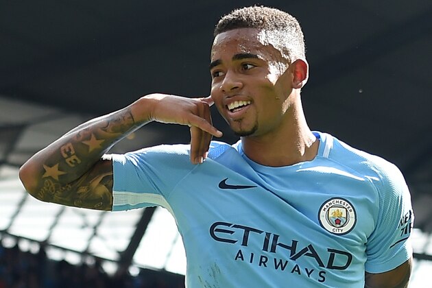 Manchester City's Brazilian striker Gabriel Jesus celebrates after scoring their second goal during the English Premier League football match between Manchester City and Liverpool at the Etihad Stadium in Manchester, north west England, on September 9, 2017. / AFP PHOTO / PAUL ELLIS / RESTRICTED TO EDITORIAL USE. No use with unauthorized audio, video, data, fixture lists, club/league logos or 'live' services. Online in-match use limited to 75 images, no video emulation. No use in betting, games or single club/league/player publications.  /         (Photo credit should read PAUL ELLIS/AFP/Getty Images)