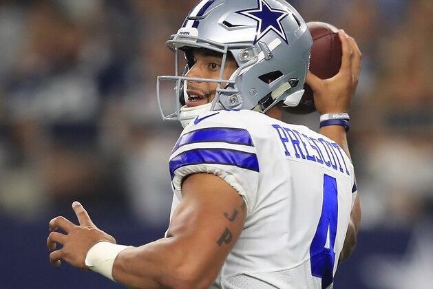 ARLINGTON, TX - SEPTEMBER 10:  Dak Prescott #4 of the Dallas Cowboys looks to pass in the second half of a game against the New York Giants at AT&T Stadium on September 10, 2017 in Arlington, Texas.  (Photo by Ronald Martinez/Getty Images)