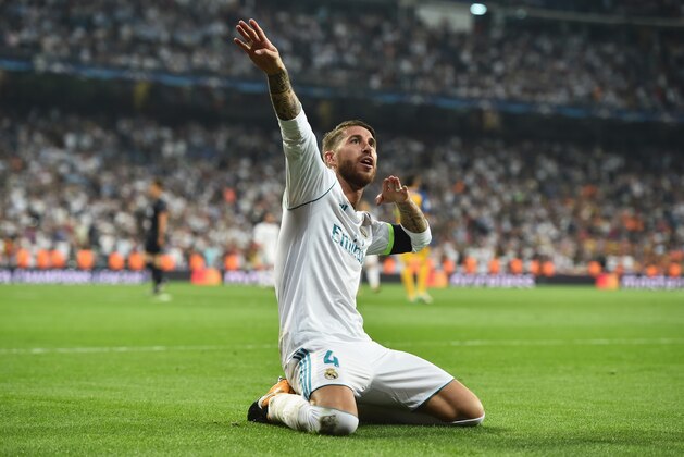 MADRID, SPAIN - SEPTEMBER 13: Sergio Ramos of Real Madrid celebrates scoring his sides third goal during the UEFA Champions League group H match between Real Madrid and APOEL Nikosia at Estadio Santiago Bernabeu on September 13, 2017 in Madrid, Spain.  (Photo by Denis Doyle/Getty Images)
