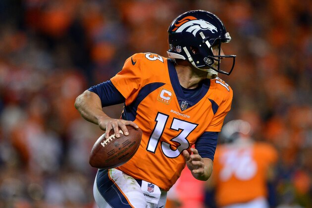 DENVER, CO - SEPTEMBER 11:    Quarterback Trevor Siemian #13 of the Denver Broncos rolls out of the pocket against the Los Angeles Chargers  at Sports Authority Field at Mile High on September 11, 2017 in Denver, Colorado. (Photo by Dustin Bradford/Getty Images)