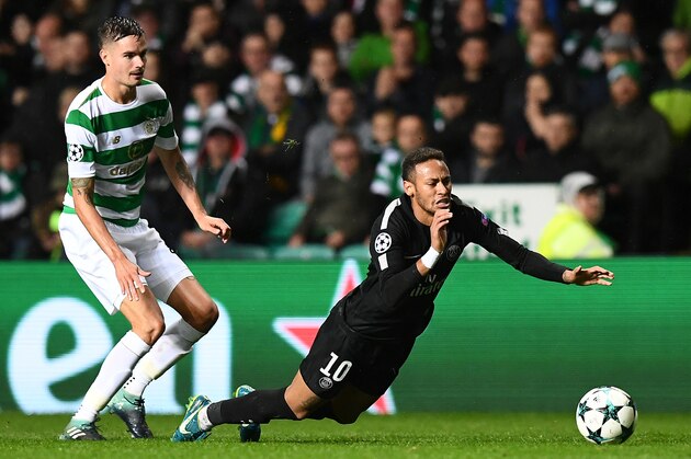 Paris Saint-Germain's Brazilian striker Neymar (R) falls after a tackle from Celtic's Swedish defender Mikael Lustig during the UEFA Champions League Group B football match between Celtic and Paris Saint-Germain (PSG) at Celtic Park in Glasgow, on September 12, 2017. / AFP PHOTO / FRANCK FIFE        (Photo credit should read FRANCK FIFE/AFP/Getty Images)