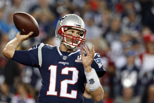 New England Patriots quarterback Tom Brady warms up before an NFL football game against the Kansas City Chiefs, Thursday, Sept. 7, 2017, in Foxborough, Mass. (AP Photo/Michael Dwyer)