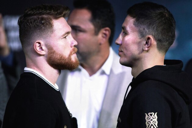 LONDON, ENGLAND - JUNE 19: Canelo Alvarez and Gennady Golovkin pose for a picture with Frank Warren after the Canelo Alvarez vs Gennady Golovkin boxing press conference at the Landmark Hotel on June 19, 2017 in London, England.  (Photo by Steve Bardens/Getty Images)