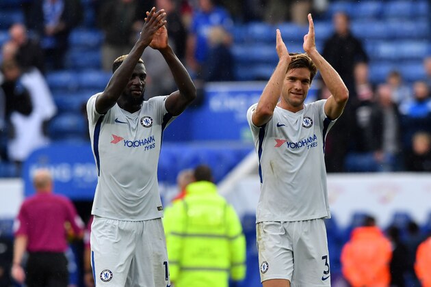 Chelsea's French midfielder Tiemoue Bakayoko (L) and Chelsea's Spanish defender Marcos Alonso applaud supporters after the English Premier League football match between Leicester City and Chelsea at King Power Stadium in Leicester, central England on September 9, 2017.
Chelsea won the game 2-1. / AFP PHOTO / Ben STANSALL / RESTRICTED TO EDITORIAL USE. No use with unauthorized audio, video, data, fixture lists, club/league logos or 'live' services. Online in-match use limited to 75 images, no video emulation. No use in betting, games or single club/league/player publications.  /         (Photo credit should read BEN STANSALL/AFP/Getty Images)