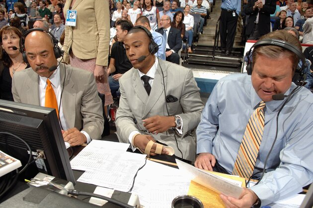 WASHINGTON - APRIL 30:  Caron Butler (c) of the Washington Wizards sits with television analyst Phil Chenier (l) and play-by-play announcer Steve Buckhantz during the game against the Cleveland Cavaliers in Game Four of the Eastern Conference Quarterfinals during the 2007 NBA Playoffs at the Verizon Center on April 30, 2007 in Washington, D.C. The Cavs won 97-90. NOTE TO USER: User expressly acknowledges and agrees that, by downloading and/or using this Photograph, user is consenting to the terms and conditions of the Getty Images License Agreement. Mandatory Copyright Notice: Copyright 2007 NBAE  (Photo by Mitchell Layton/NBAE via Getty Images)