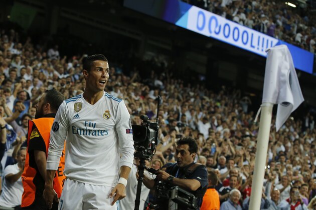 Real Madrid's Cristiano Ronaldo reacts after scoring the first goal during a Champions League group H soccer match between Real Madrid and Apoel Nicosia at the Santiago Bernabeu stadium in Madrid, Spain, Wednesday, Sept. 13, 2017. (AP Photo/Paul White)