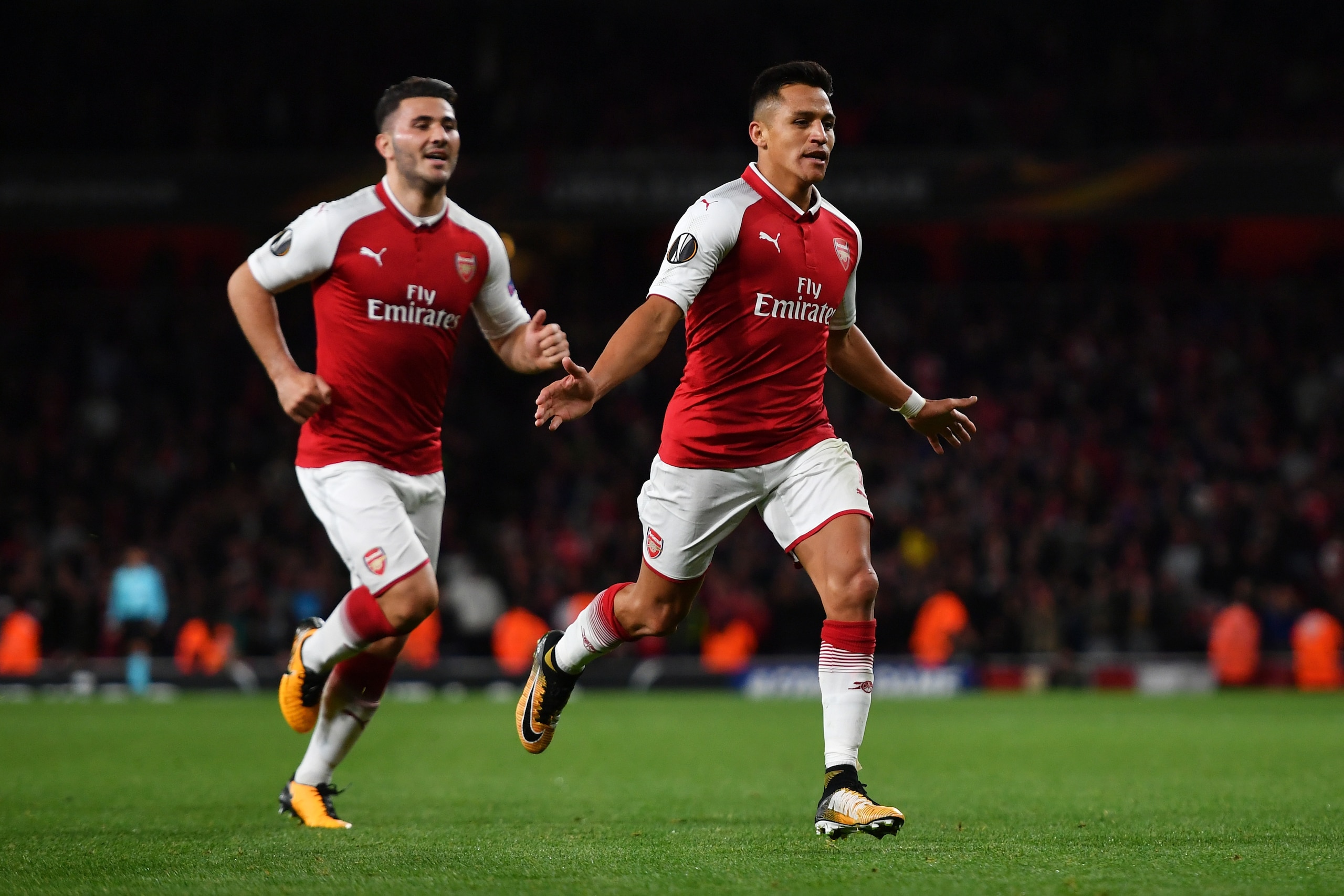 LONDON, ENGLAND - SEPTEMBER 14:  Alexis Sanchez of Arsenal celebrates scoring the 2nd arsenal goal with Sead Kolasinac of Arsenal during the UEFA Europa League group H match between Arsenal FC and 1. FC Koeln at Emirates Stadium on September 14, 2017 in London, United Kingdom.  (Photo by Dan Mullan/Getty Images)
