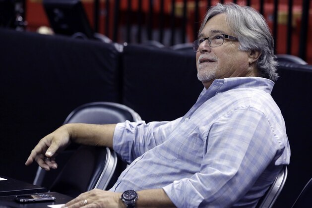 Miami Heat owner Micky Arison looks on during a media availability for players during basketball practice at the NBA Finals, Wednesday, June 11, 2014, in Miami. The San Antonio Spurs lead the Heat 2-1 in the best-of-seven games series. (AP Photo/Lynne Sladky)