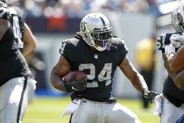 NASHVILLE, TN- SEPTEMBER 10:  Running back Marshawn Lynch  #24 of the Oakland Raiders runs the ball against the Tennessee Titans in the second half at Nissan Stadium on September 10, 2017 In Nashville, Tennessee. (Photo by Wesley Hitt/Getty Images) )