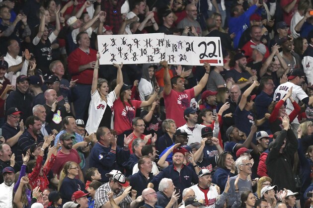 Sep 14, 2017; Cleveland, OH, USA; Fans celebrate after a Cleveland Indians extra-inning win over the Kansas City Royals at Progressive Field. Mandatory Credit: David Richard-USA TODAY Sports