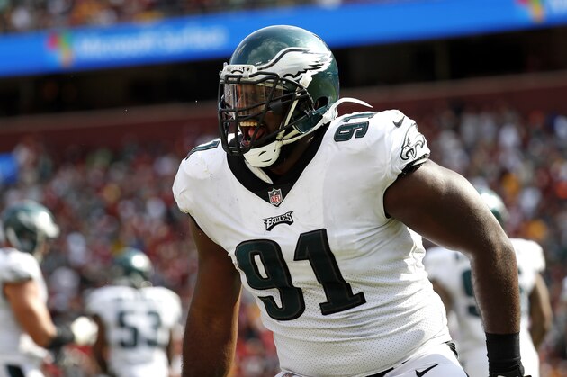 Philadelphia Eagles defensive tackle Fletcher Cox celebrates after officials reviewed and confirmed a play in which Washington Redskins quarterback Kirk Cousins fumbled and Cox recovered and scored a touchdown in the second half of an NFL football game, Sunday, Sept. 10, 2017, in Landover, Md. Philadelphia won 30-17. (AP Photo/Alex Brandon)