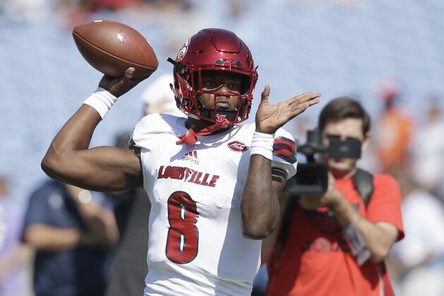 Louisville quarterback Lamar Jackson (8) warms up prior to an NCAA college football game against North Carolina in Chapel Hill, N.C., Saturday, Sept. 9, 2017. (AP Photo/Gerry Broome)