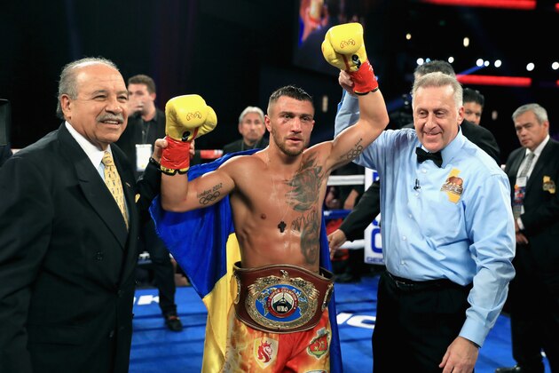 LOS ANGELES, CA - AUGUST 05:  Vasyl Lomachenko of Ukraine reacts after defeatin  Miguel Marriaga of Columbia by TKO  in the seventh round  during their WBO World Championship Junior Lightweight title fight at the  Microsoft Theater on August 5, 2017 in Los Angeles, California.  (Photo by Sean M. Haffey/Getty Images)