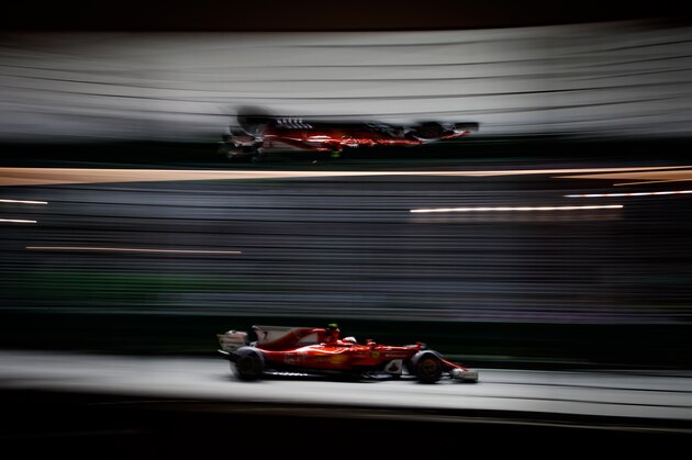 SINGAPORE - SEPTEMBER 15: Kimi Raikkonen of Finland driving the (7) Scuderia Ferrari SF70H on track during practice for the Formula One Grand Prix of Singapore at Marina Bay Street Circuit on September 15, 2017 in Singapore.  (Photo by Lars Baron/Getty Images)