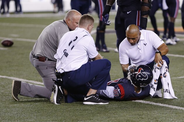 Houston Texans cornerback Kevin Johnson lies on the field after an apparent injury during the second half of an NFL football game against the Cincinnati Bengals, Thursday, Sept. 14, 2017, in Cincinnati. (AP Photo/Frank Victores)