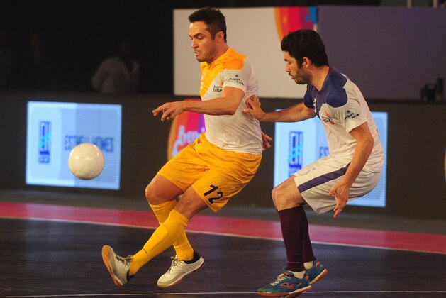 Alessandro Rosa Viera, also known Falcao, from the Chennai 5's plays against the Kochi 5's Gekabert during their Premier Futsal Football League match in Chennai on July 15, 2016 / AFP PHOTO / ARUN SANKAR        (Photo credit should read ARUN SANKAR/AFP/Getty Images)