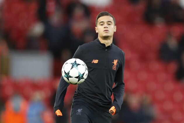 Liverpool's Philippe Coutinho controls the ball during a warm up prior to the start of the Champions League group E soccer match between Liverpool and Sevilla at Anfield stadium in Liverpool, England, Wednesday, Sept. 13, 2017. (AP Photo/Frank Augstein)