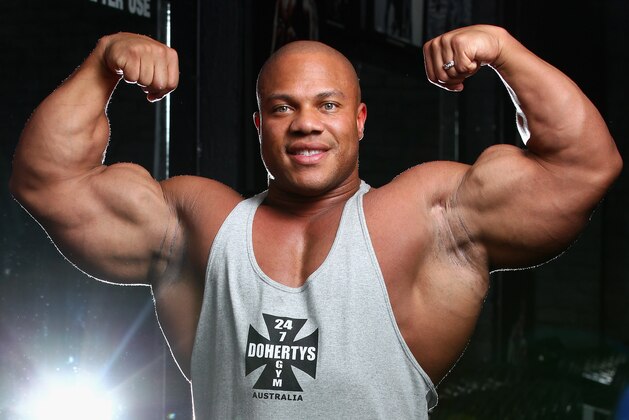 MELBOURNE, AUSTRALIA - MARCH 16:  Mr Olympia Phil Heath poses during a media call ahead of the 2012 IFBB Australian Pro Grand Prix XIII on March 16, 2012 in Melbourne, Australia.  (Photo by Robert Cianflone/Getty Images)