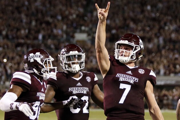 Mississippi State quarterback Nick Fitzgerald (7) celebrates his three-yard touchdown run against LSU during the first half of their NCAA college football game against in Starkville, Miss., Saturday, Sept. 16, 2017. (AP Photo/Rogelio V. Solis)