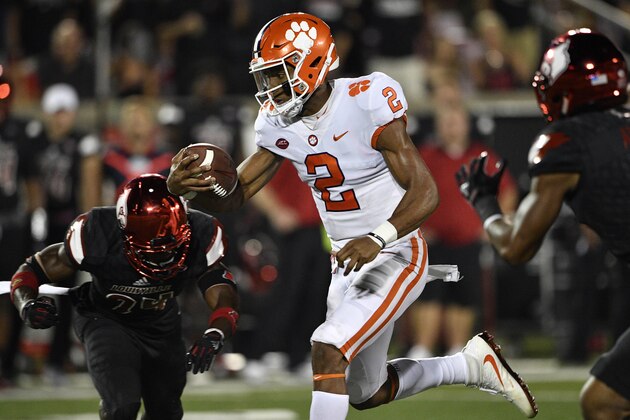 Sep 16, 2017; Louisville, KY, USA; Clemson Tigers quarterback Kelly Bryant (2) runs the ball past Louisville Cardinals defensive back Zykiesis Cannon (24) during the second quarter at Papa John's Cardinal Stadium. Mandatory Credit: Jamie Rhodes-USA TODAY Sports